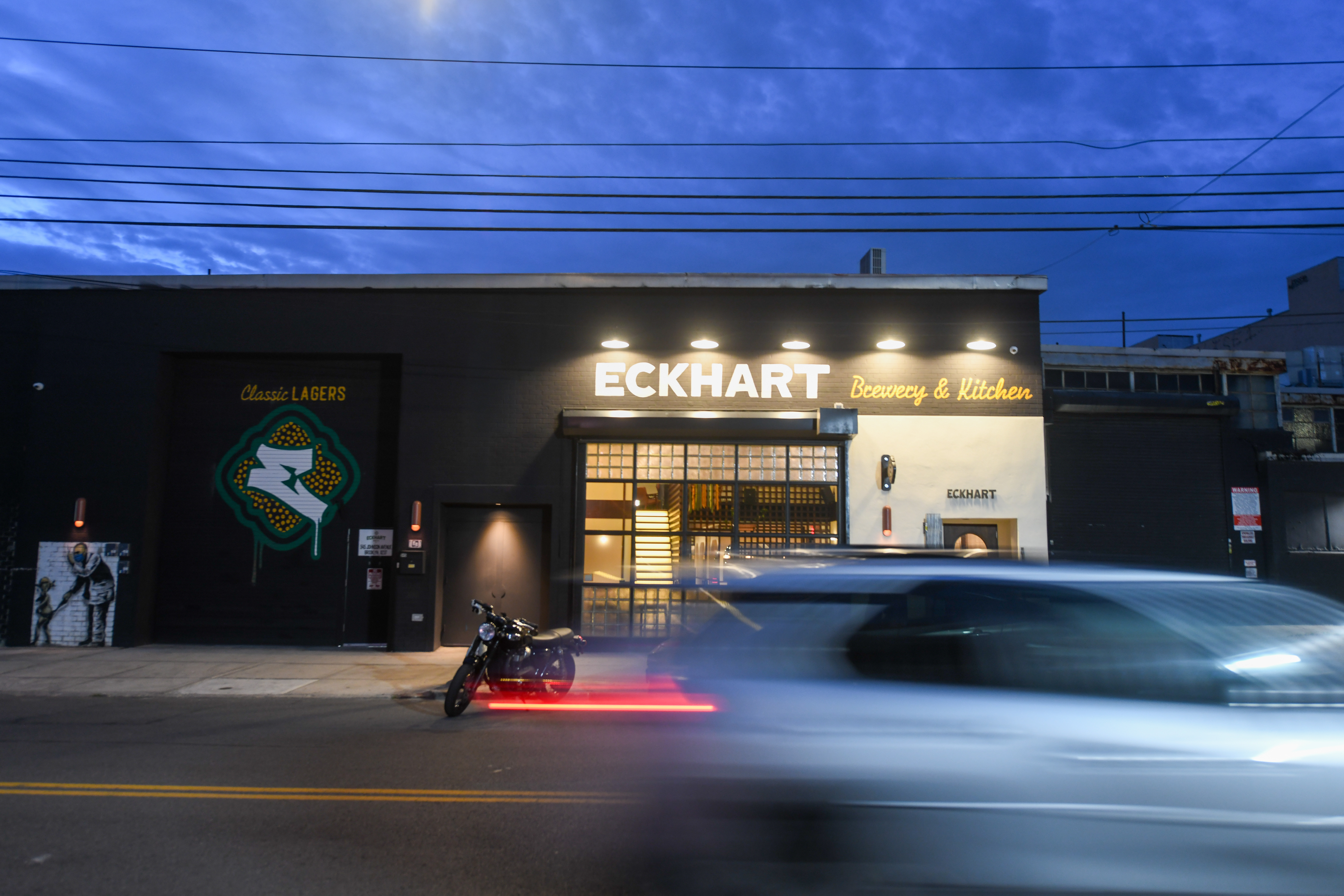 Eckhart Beer Co. taproom exterior at night in Bushwick, Brooklyn