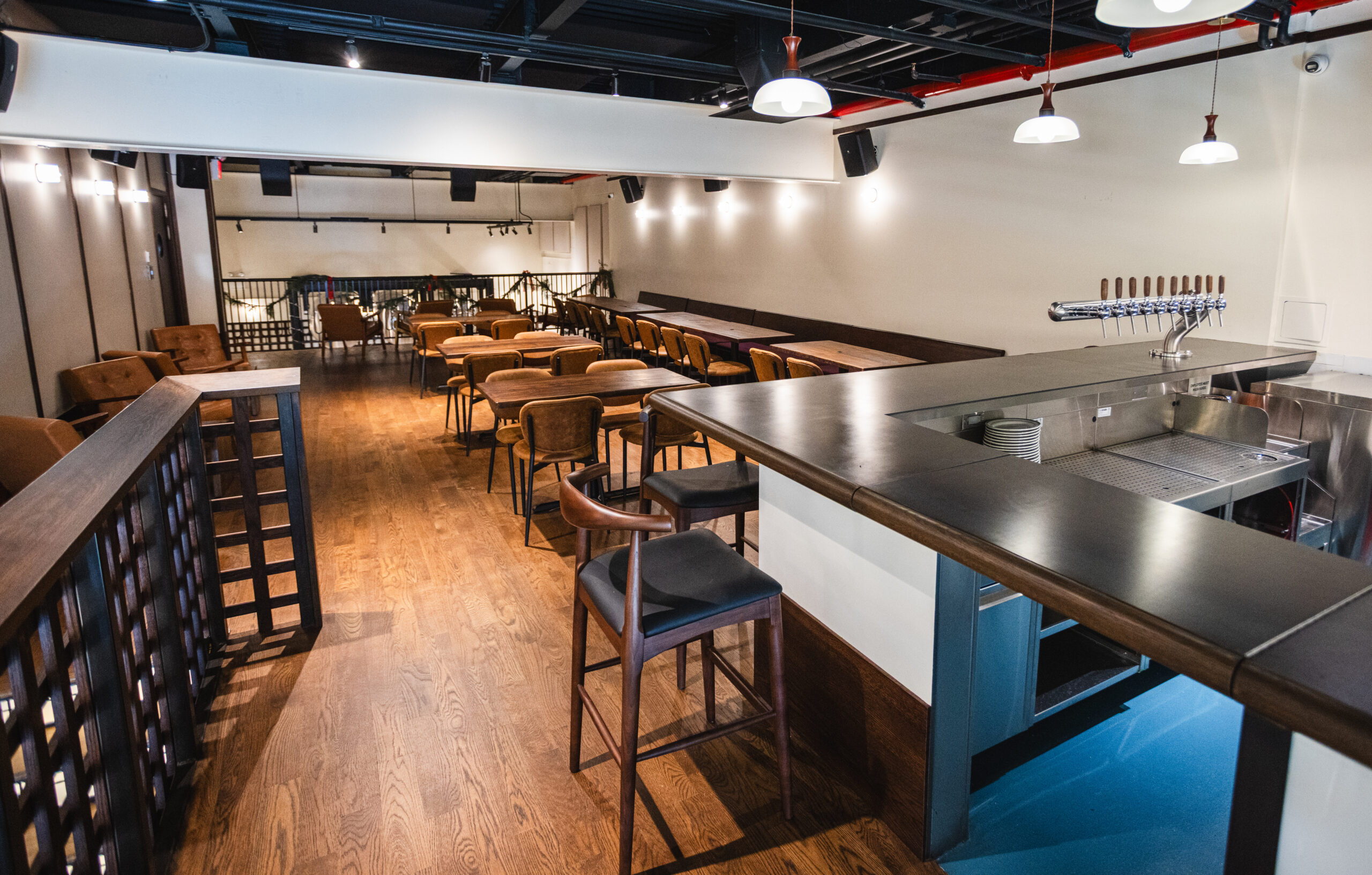 Eckhart Beer Co. mezzanine bar seating with lounge chairs